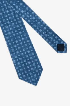 Cravatta disegno geometrico azzurra