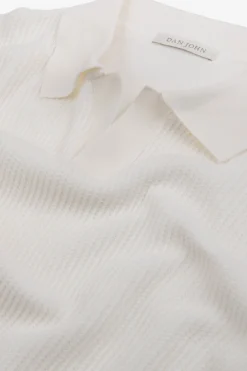 Polo in maglia collo aperto armaturata panna