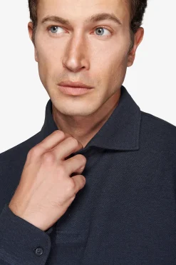 Polo in maglia con bottoni blu
