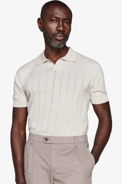 Polo in maglia costa piatta sabbia