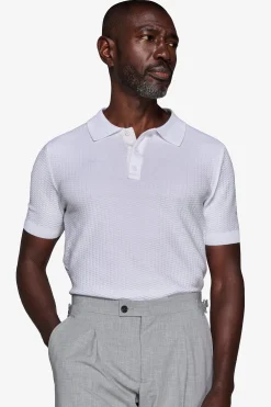 Polo in maglia punto dadino bianca