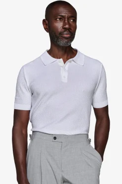 Polo in maglia punto dadino bianca