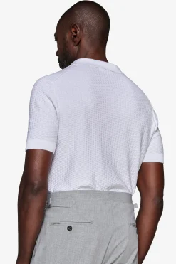 Polo in maglia punto dadino bianca