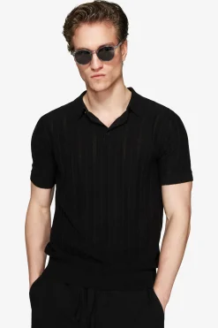 Polo in maglia traforata nera