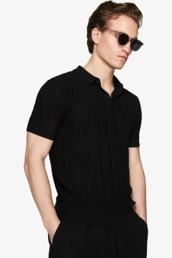 Polo in maglia traforata nera